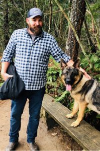 Justin Simonson and the dog his dying wife gave him before police stole it and gave it away
