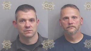 Eric Heinze, an assistant chief inspector with the U.S. Marshal’s Southeast Regional Fugitive Task Force, and Kristopher Hutchens, a Clayton County police officer working with the task force